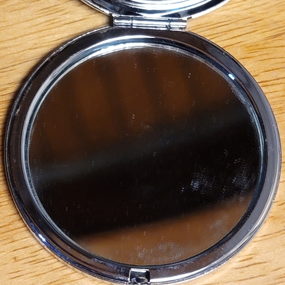 Compact, Stainless Steel, with Luminescent Background behind Design. 2" Diameter - Picture 6 of 7